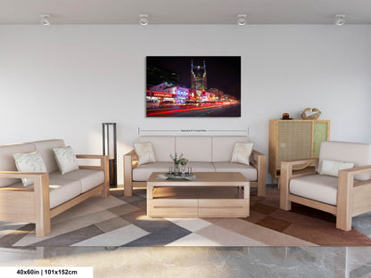 a living room filled with furniture and a painting on the wall
