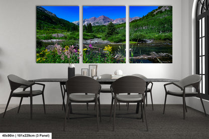 a dining room with a table and four chairs