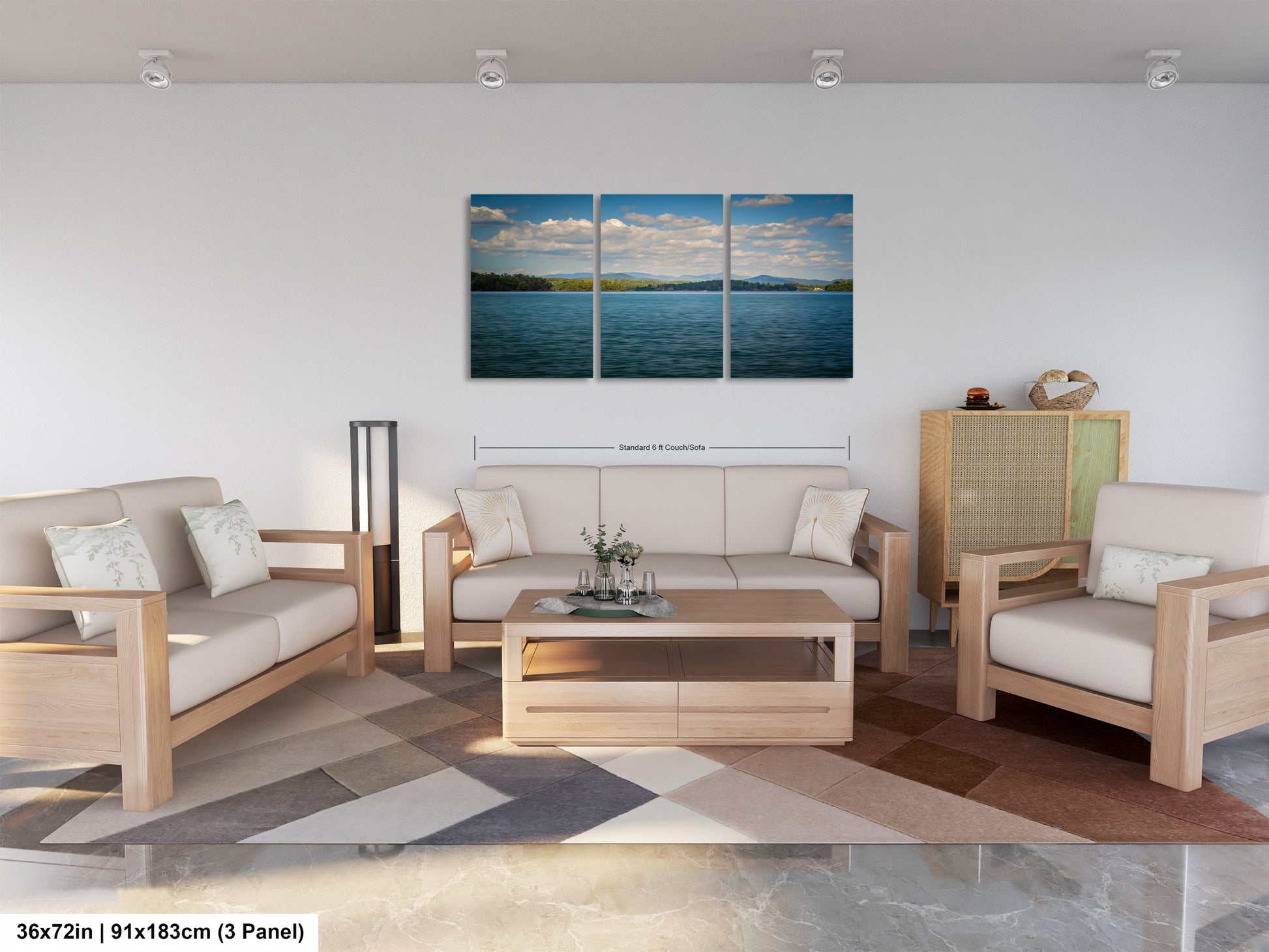 a modern living room with a large, three-panel landscape painting of a serene lake and sky above a wooden coffee table. The room is furnished with a sofa, two armchairs, and a wooden cabinet. The painting is hung on the wall above the seating area, creating a harmonious and visually appealing space.