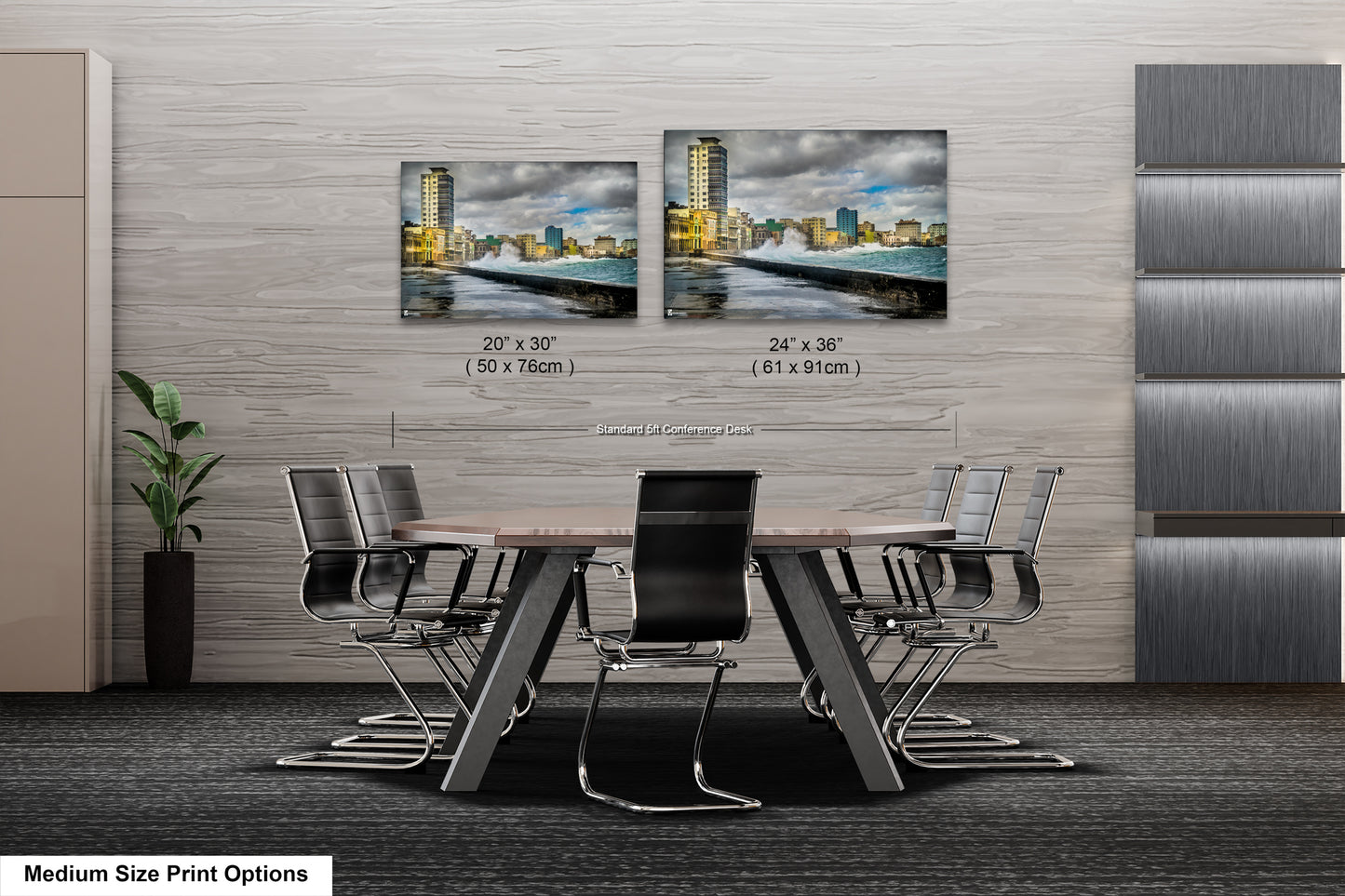 a dining room table with chairs and two pictures on the wall