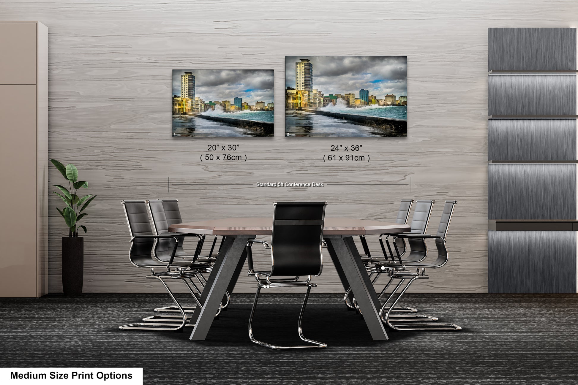 a dining room table with chairs and two pictures on the wall