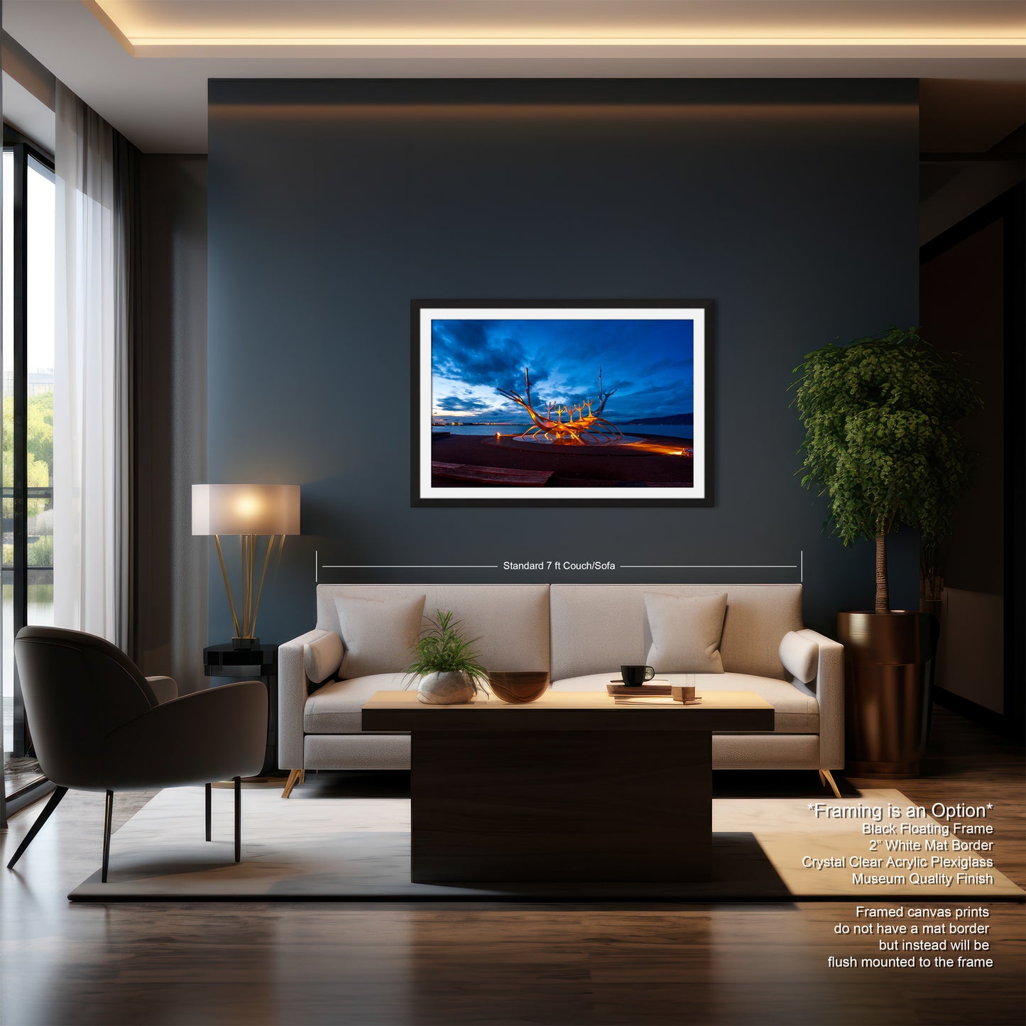 a living room with a couch a chair and a painting