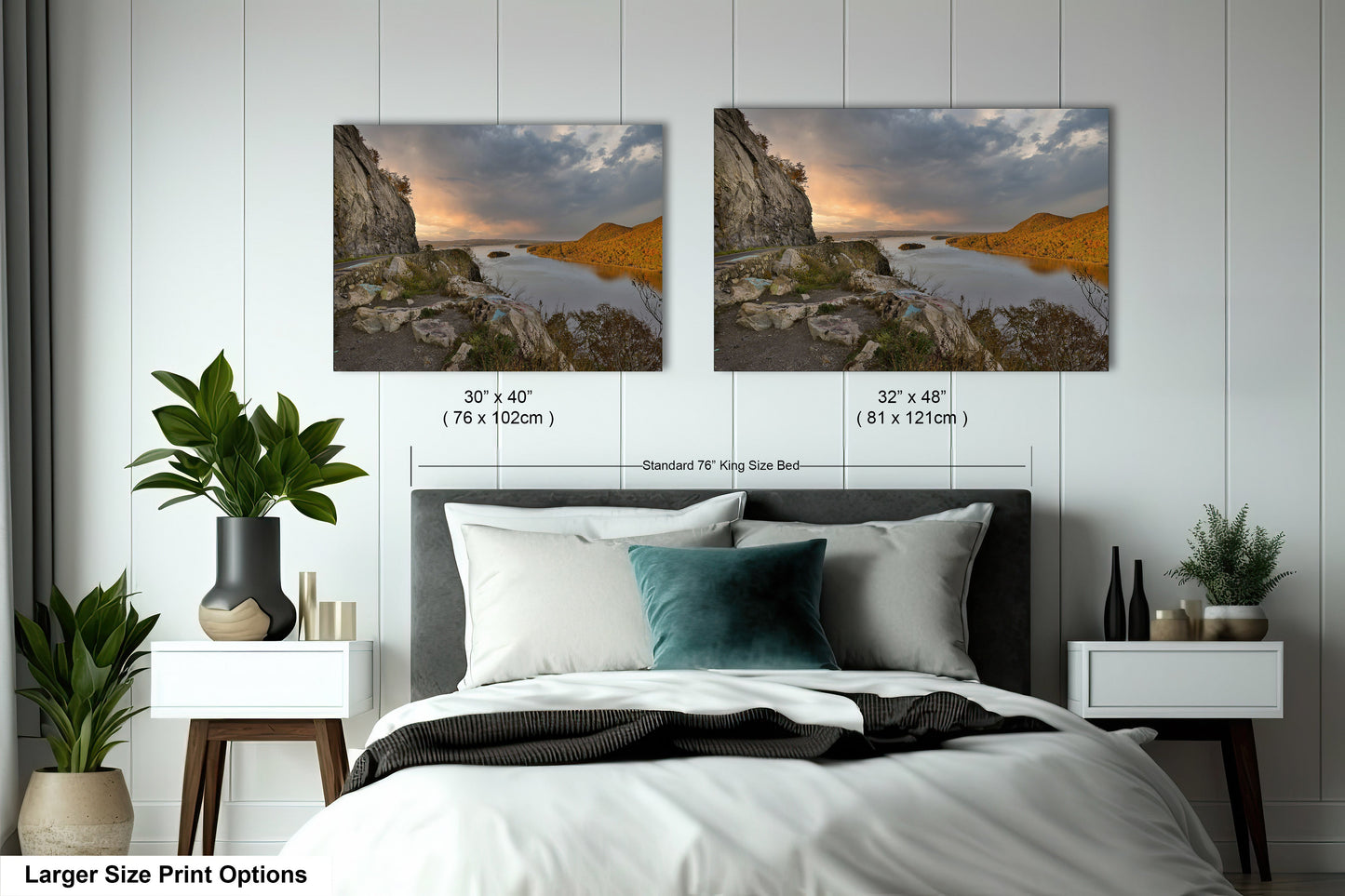 a bedroom with a bed and two pictures on the wall