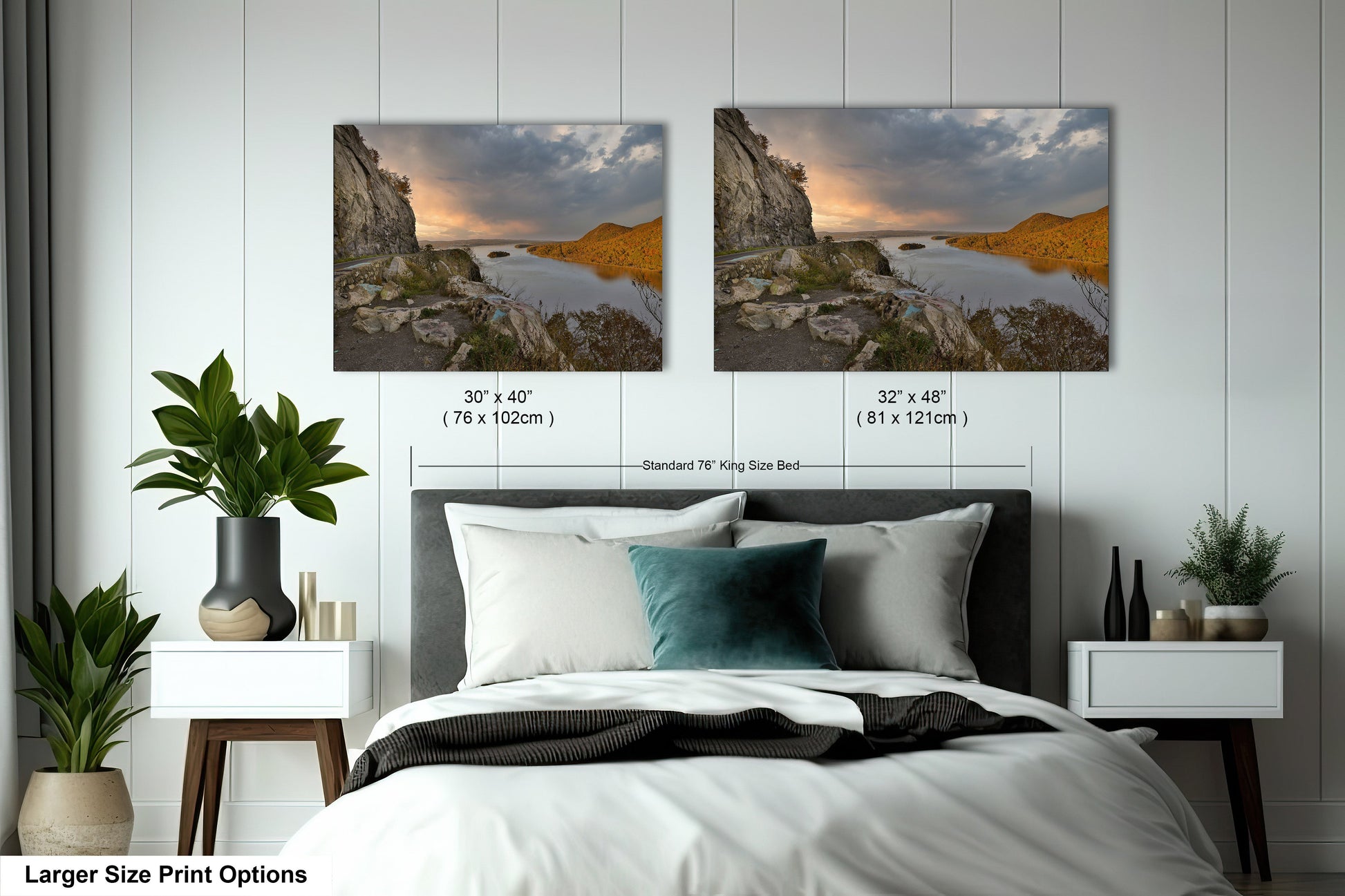 a bedroom with a bed and two pictures on the wall
