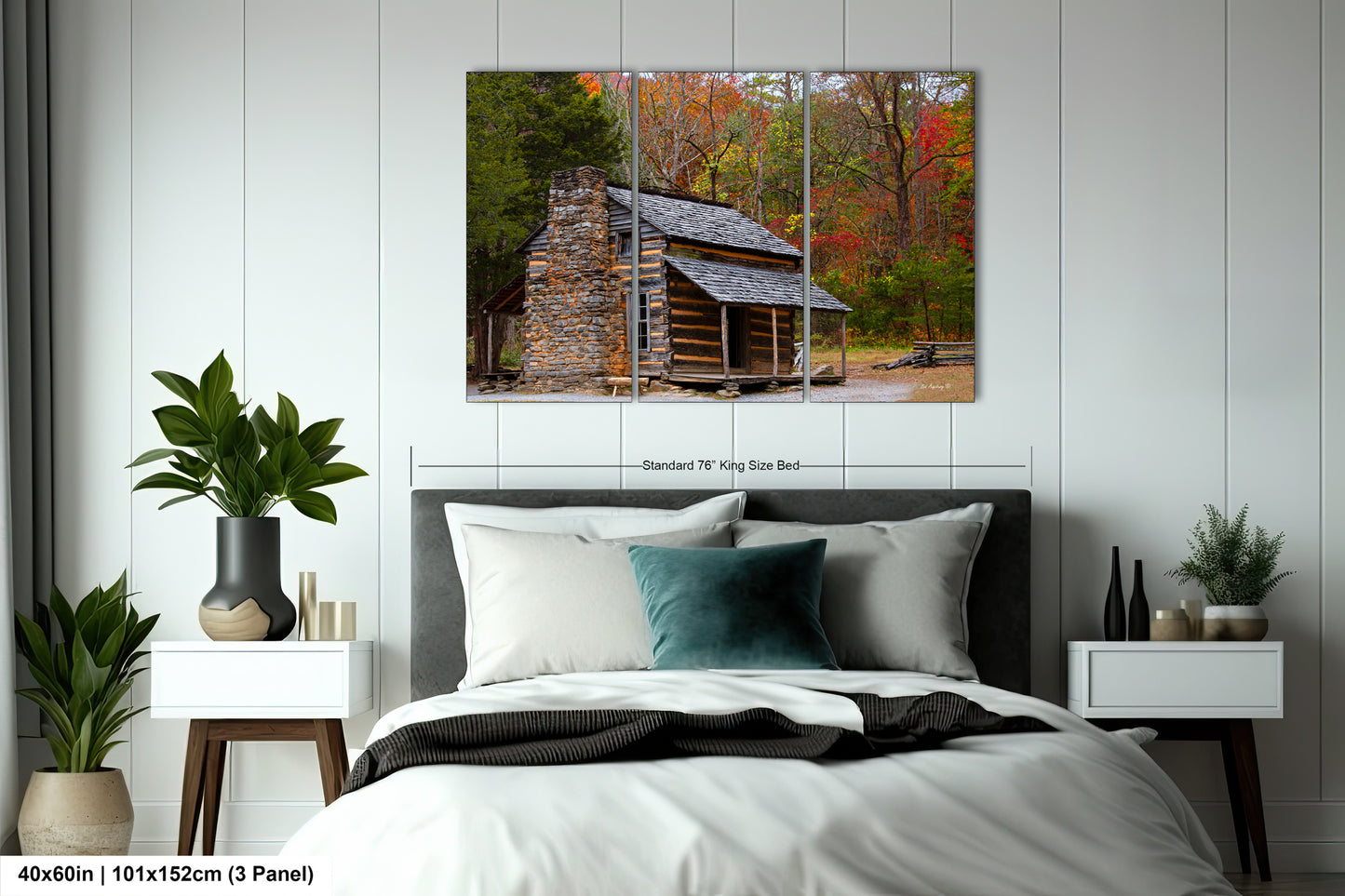 a bedroom with a bed and a painting on the wall