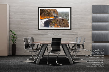 a picture of a dining room with a table and chairs