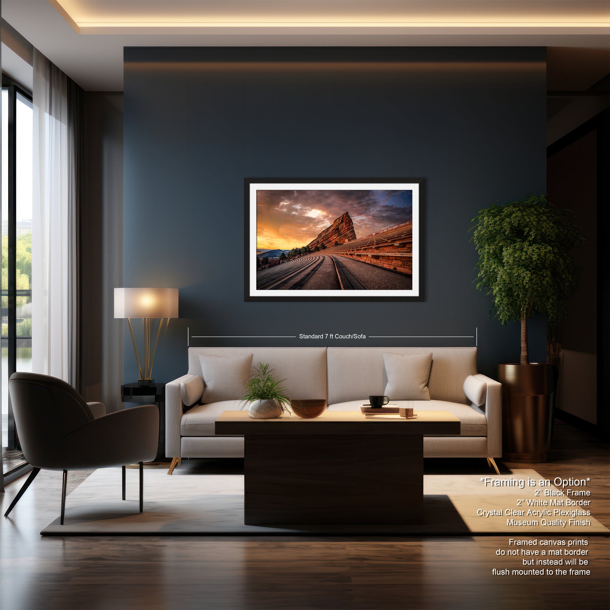 a living room with a couch a chair and a painting on the wall