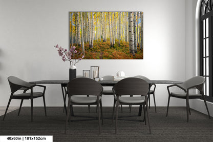 a dining room table with chairs and a painting on the wall