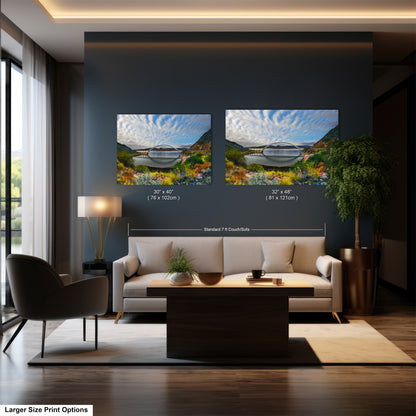 a living room filled with furniture and a painting on the wall