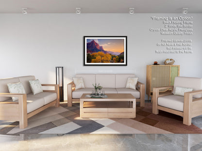 a living room filled with furniture and a painting on the wall