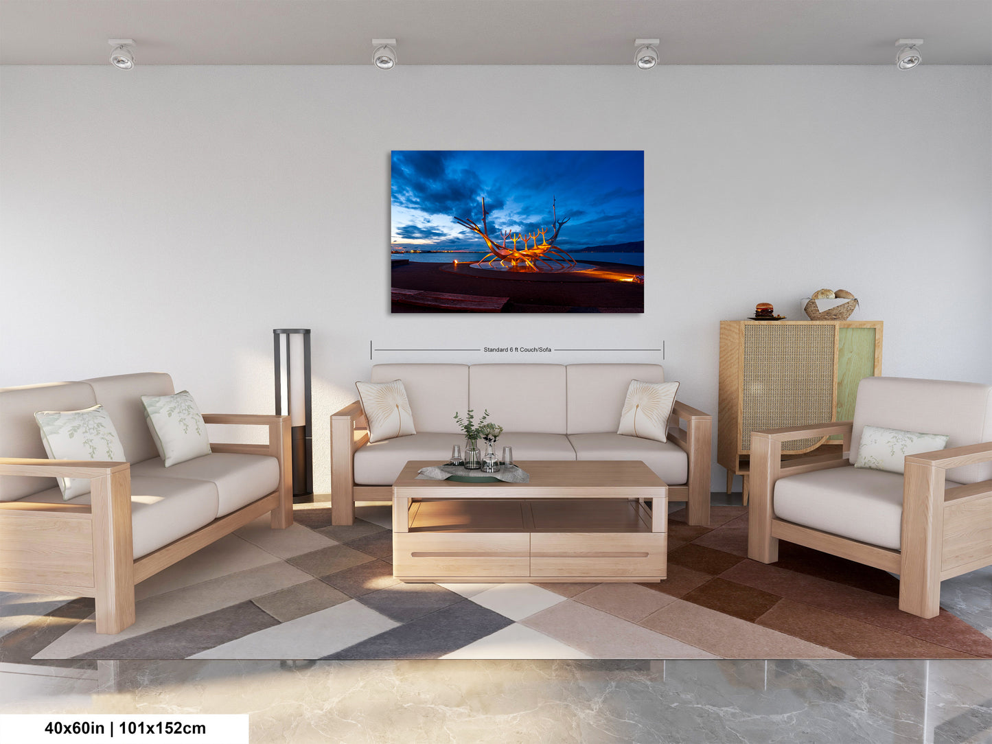 a living room filled with furniture and a painting on the wall
