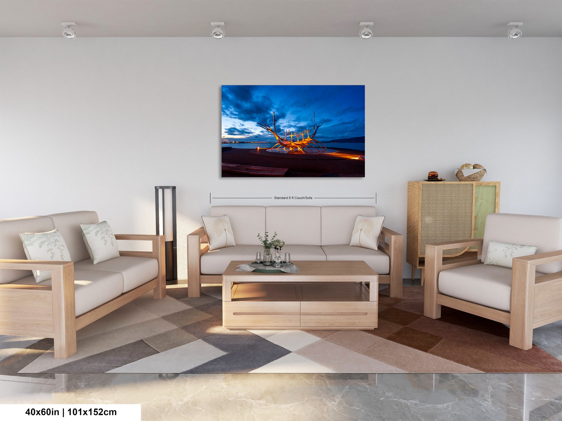 a living room filled with furniture and a painting on the wall