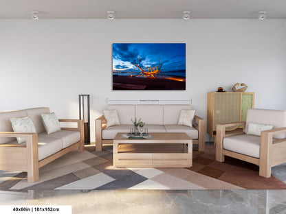 a living room filled with furniture and a painting on the wall