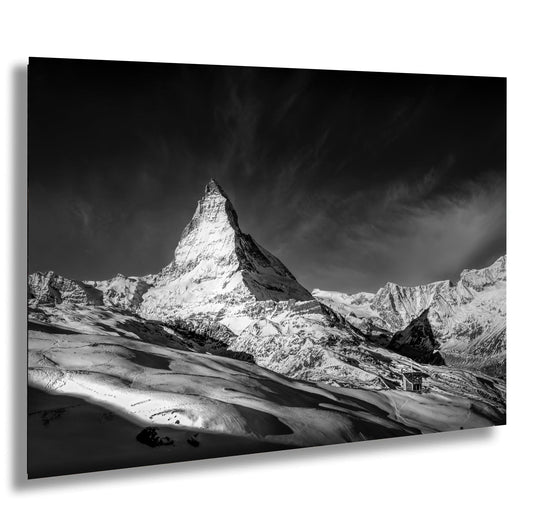 a black and white photo of a mountain