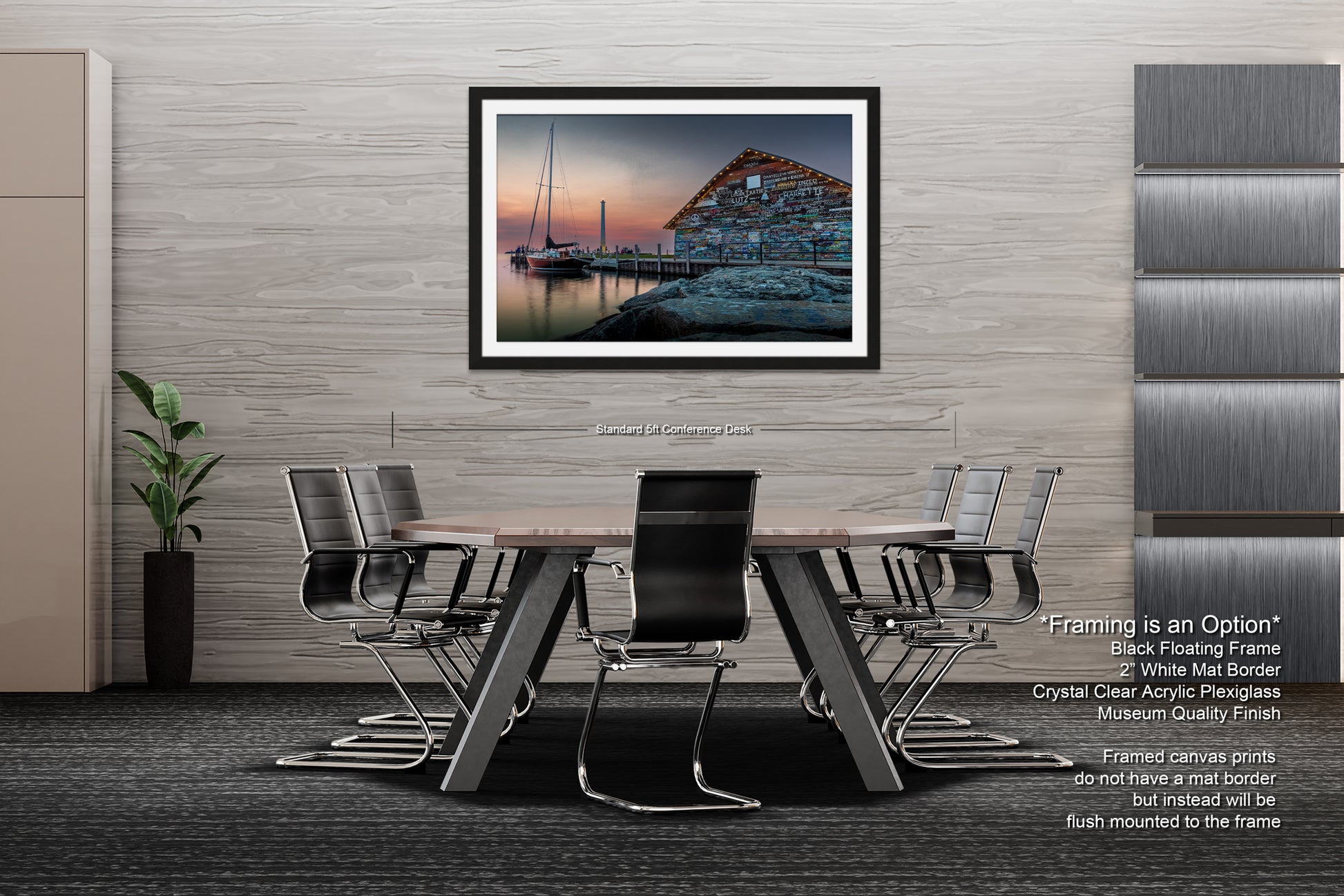 a modern living room with a large framed picture of a seascape hanging on the wall. The room is furnished with a sofa, two armchairs, and a coffee table, creating a comfortable and inviting atmosphere.