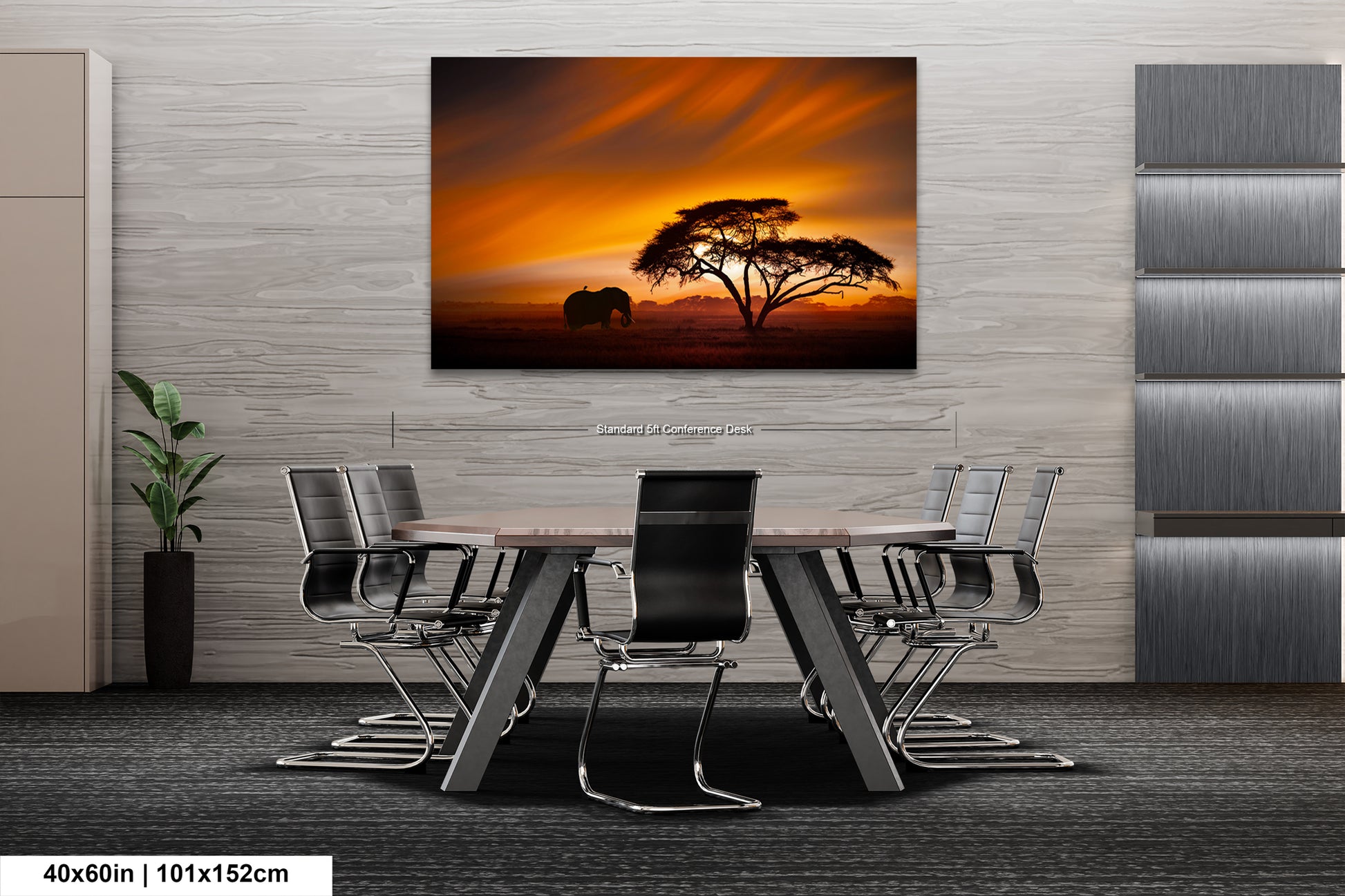 a dining room table with chairs and a painting on the wall