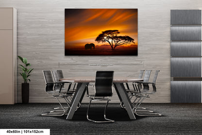 a dining room table with chairs and a painting on the wall