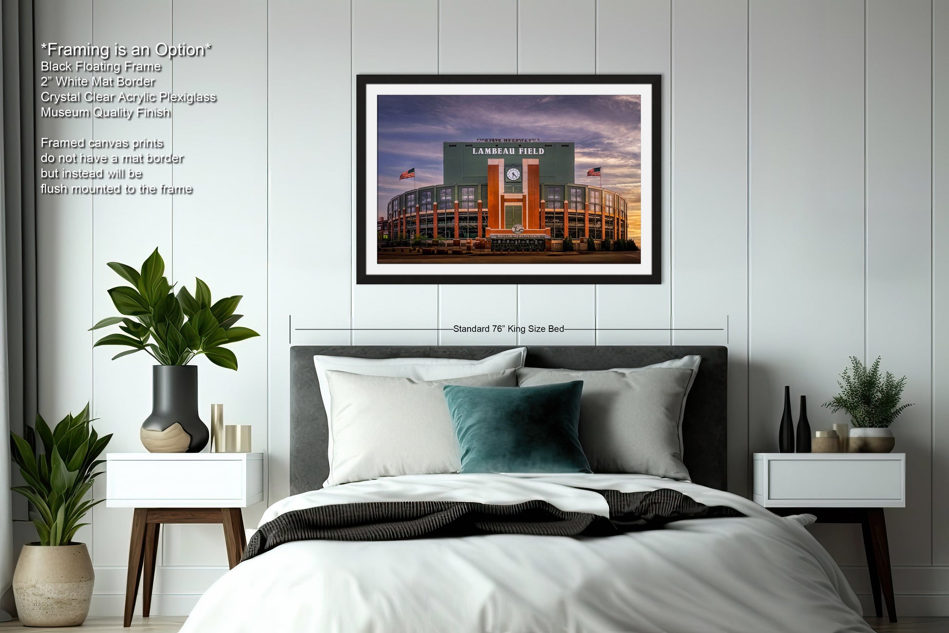 a bedroom with a bed and a picture hanging on the wall