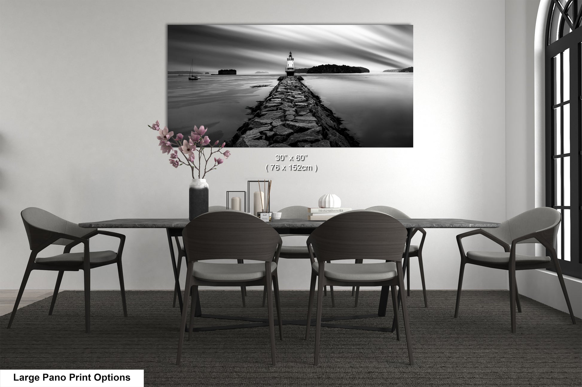 a black and white photo of a table and chairs