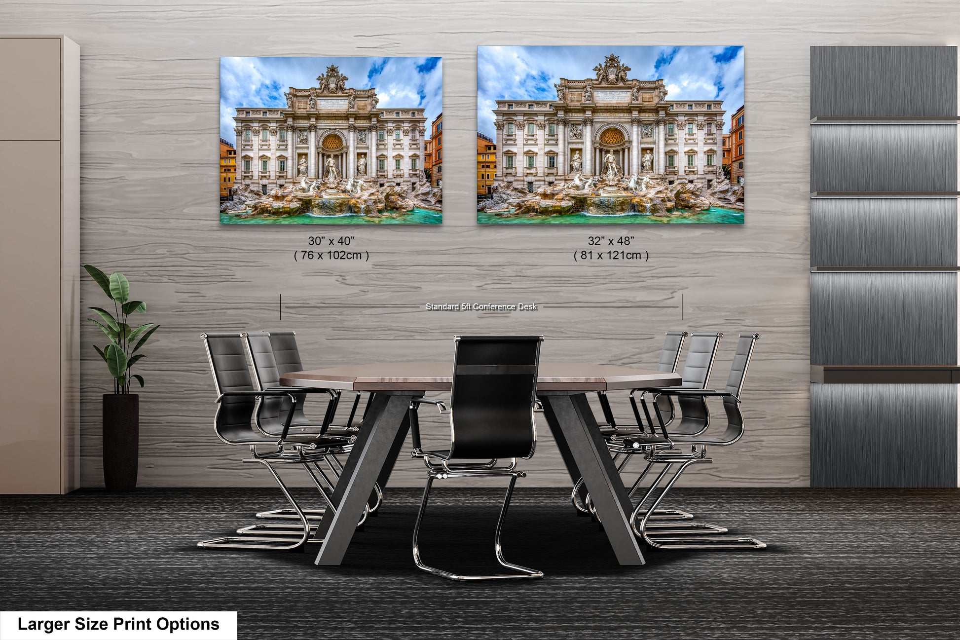 a dining room table with chairs in front of two pictures of a building