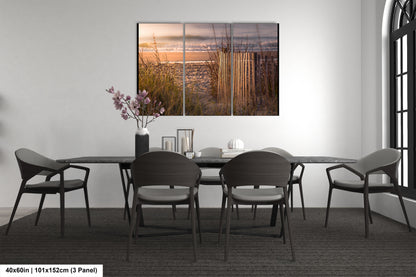 a dining room with a table and chairs