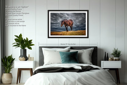 a bedroom with a bed and a picture of a horse