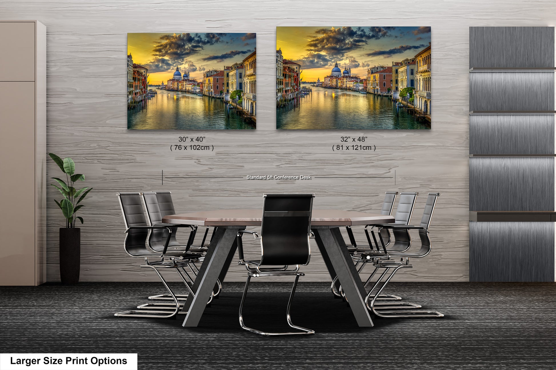 a dining room table with chairs and a painting on the wall