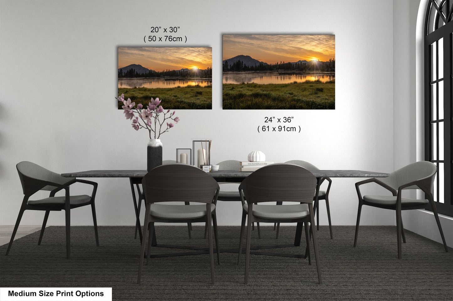 a dining room table with chairs and a vase of flowers