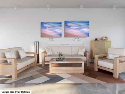 a living room filled with furniture and a painting on the wall