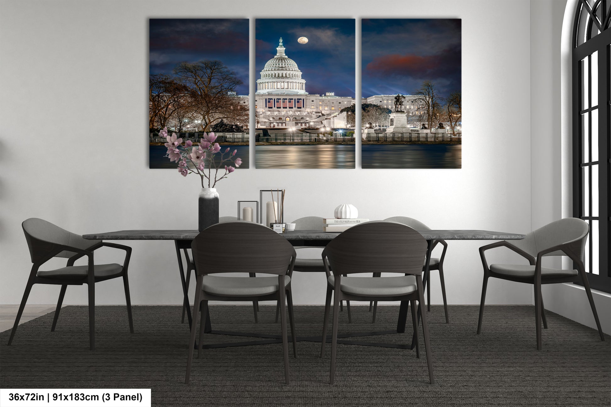 a dining room table with four chairs and a picture of the capitol building
