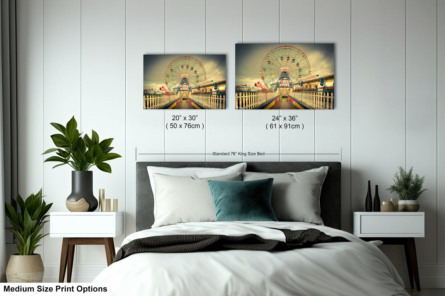 a bedroom with a bed and two pictures on the wall