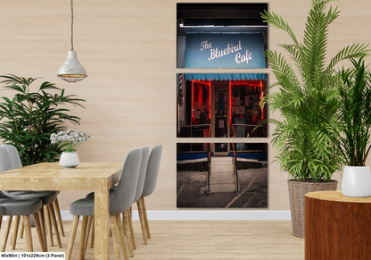 a dining room with a table and chairs