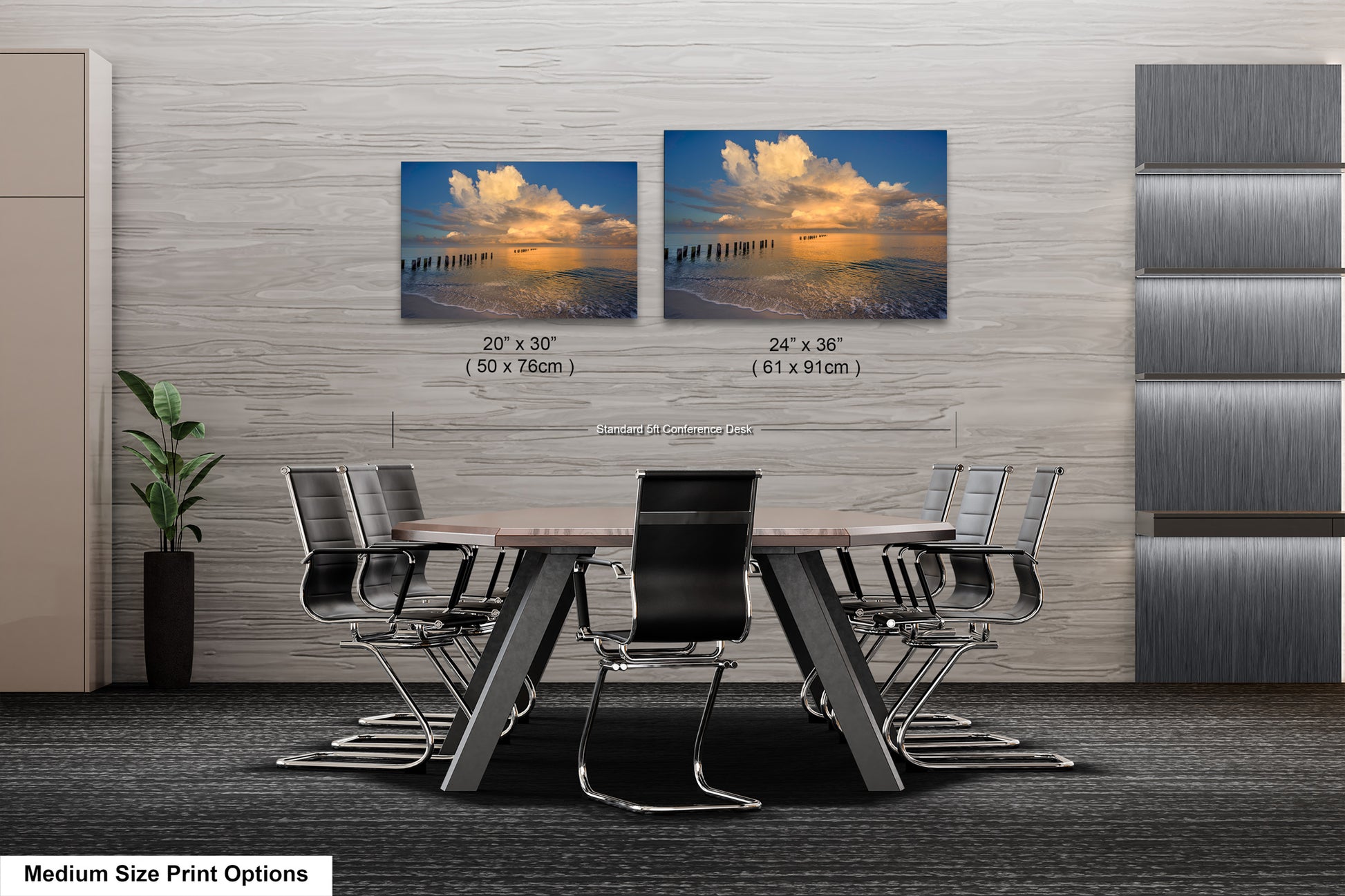 a dining room table with chairs and two pictures on the wall