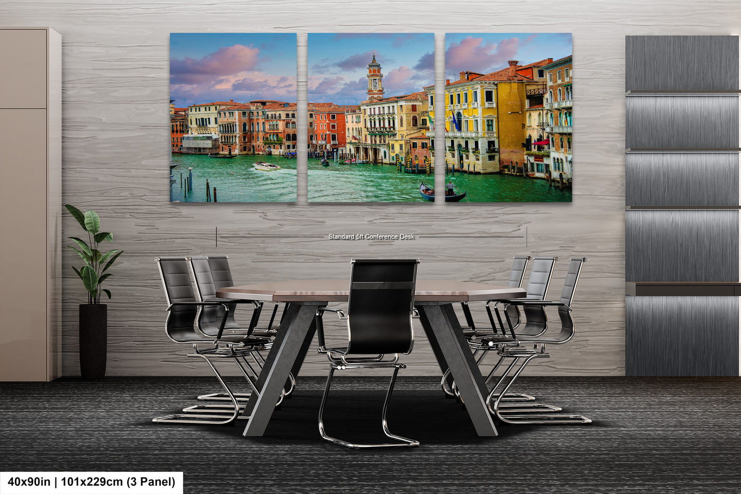 a dining room table with chairs and paintings on the wall