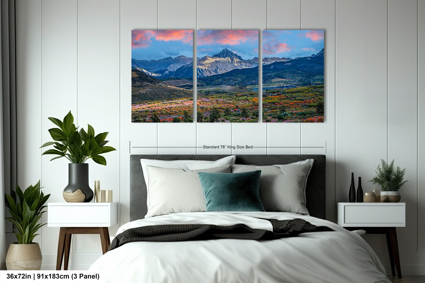 a bedroom scene with a bed and two paintings on the wall