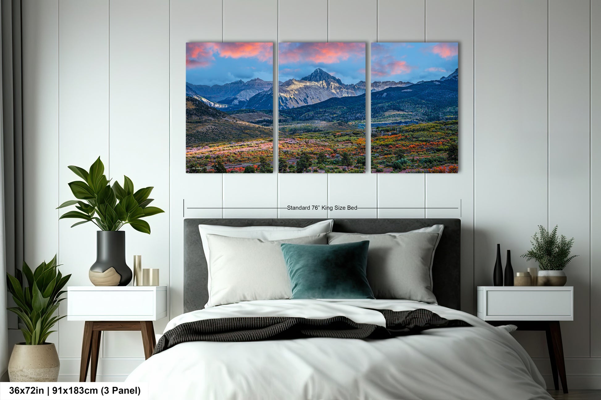 a bedroom scene with a bed and two paintings on the wall