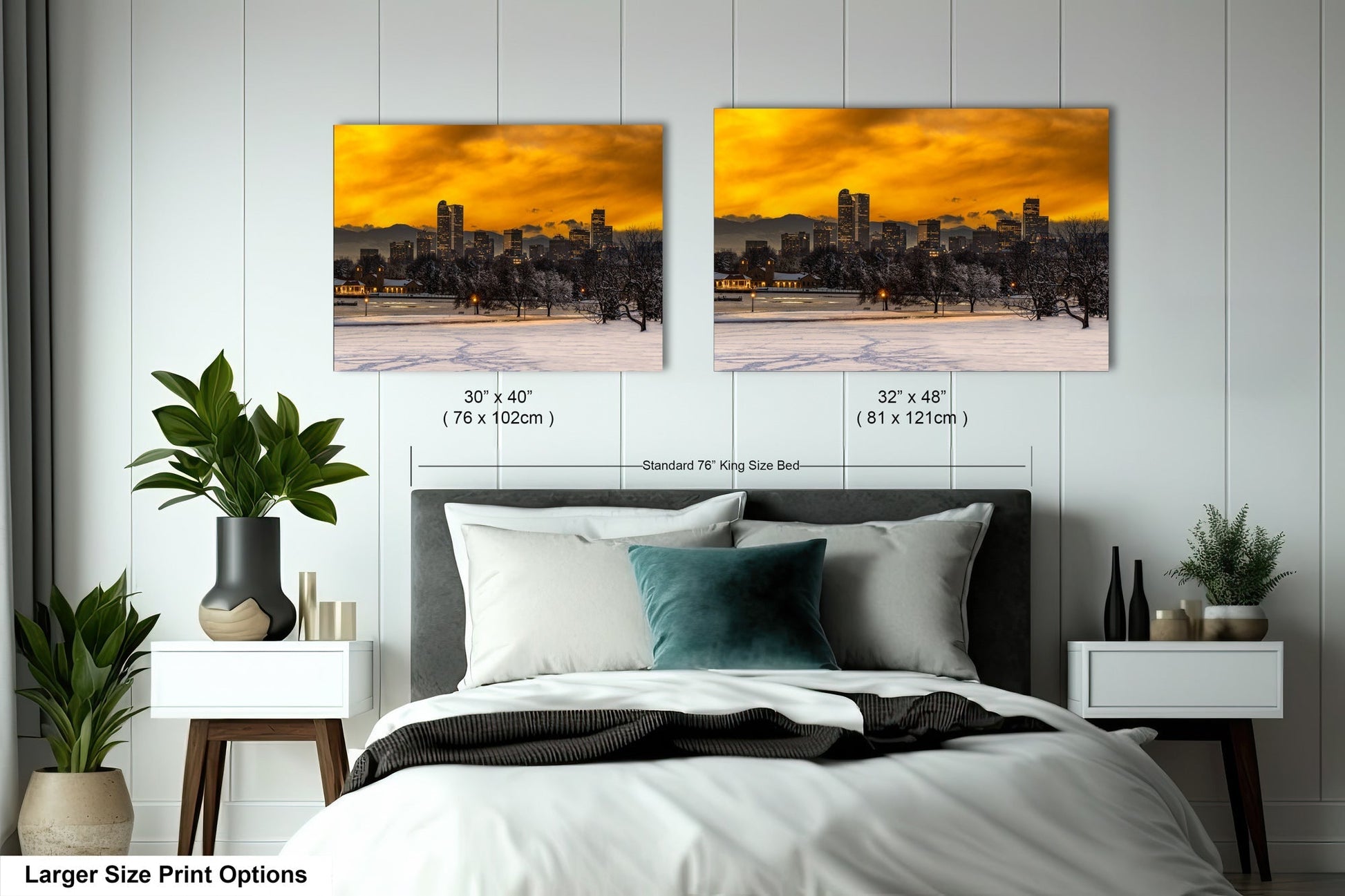 a bedroom with a bed and two pictures on the wall