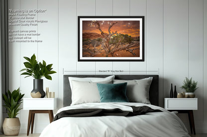 a bedroom with a large bed and a painting on the wall