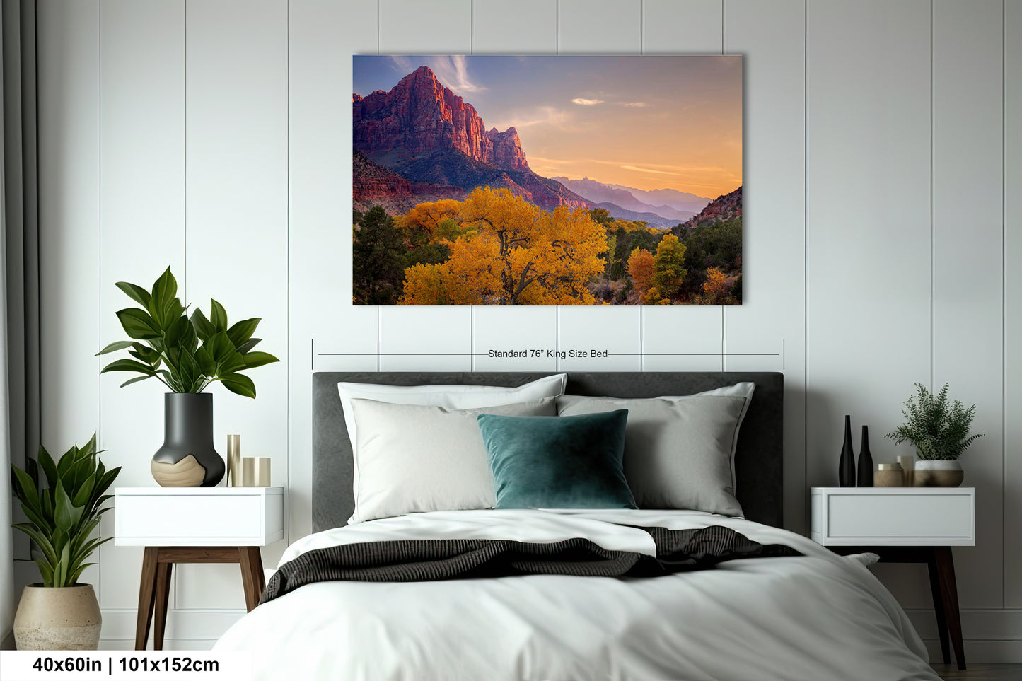 a bedroom with a bed and a painting on the wall