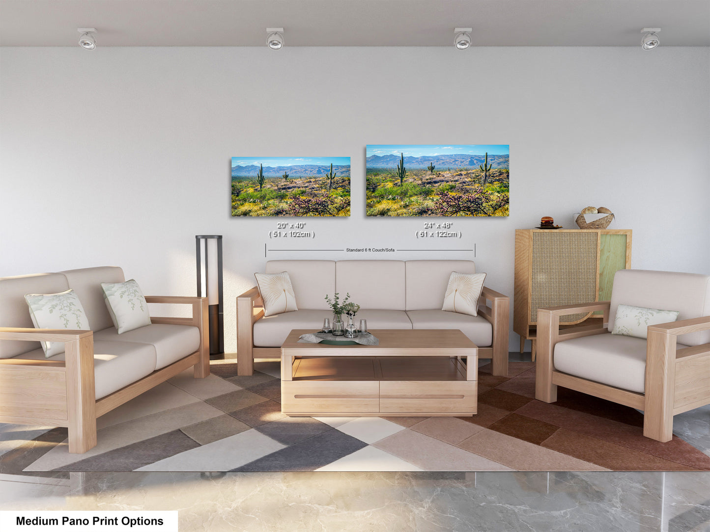 a modern living room with a large landscape painting hanging on the wall above a wooden coffee table. The room is furnished with a sofa, two armchairs, and a wooden cabinet. The overall design and decor create a contemporary and stylish atmosphere.