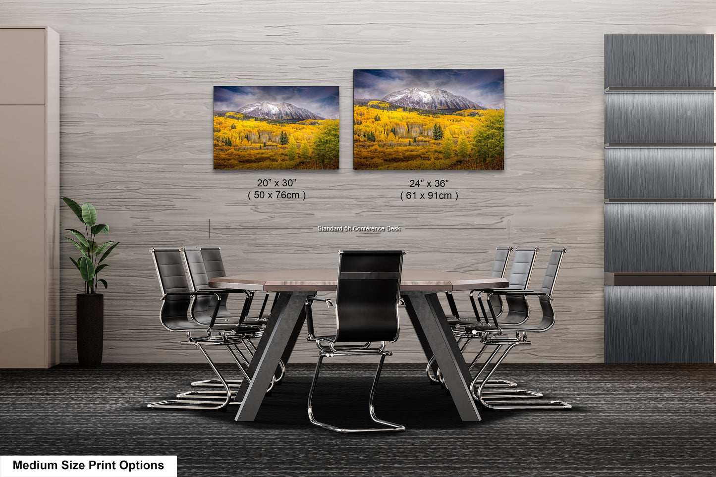 a dining room table with chairs and two pictures on the wall