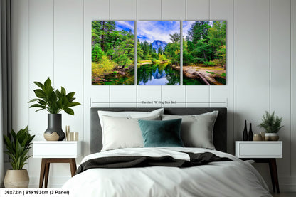 a bedroom scene with a bed and two paintings on the wall