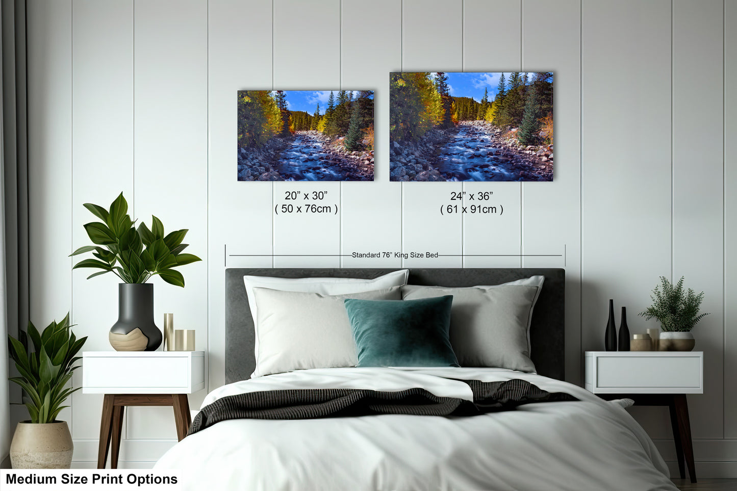 a bed room with a neatly made bed and two pictures on the wall