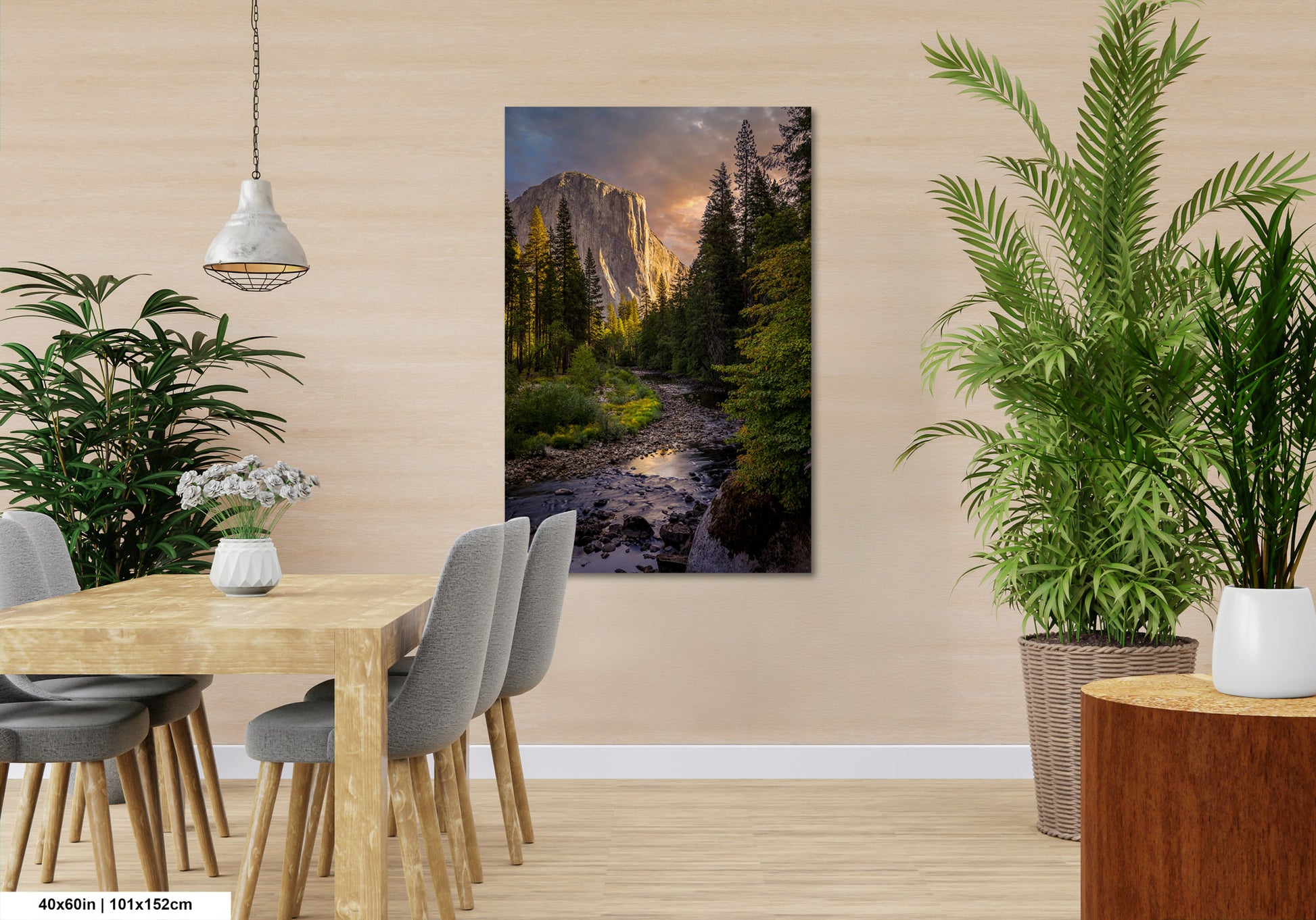 a dining room table with chairs and a painting on the wall
