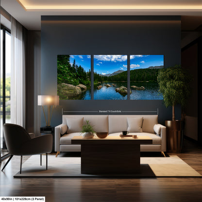 A modern living room with a large wall-mounted painting depicting a serene landscape of a lake surrounded by mountains.