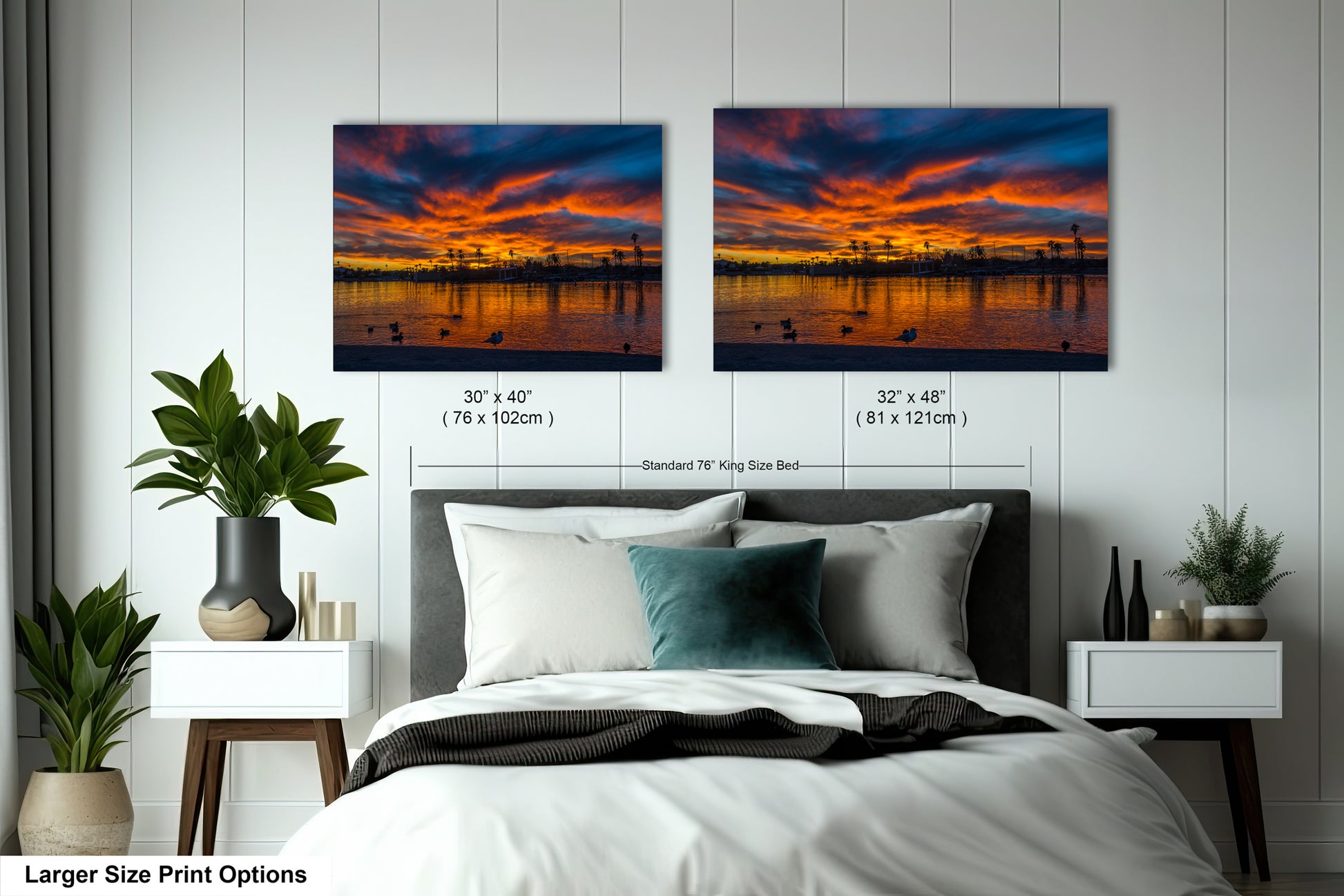a bedroom with two framed pictures of a sunset over a body of water, hanging on the wall above a bed.