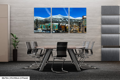 a dining room with a table and chairs