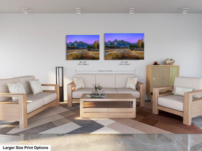 a living room filled with furniture and a painting on the wall