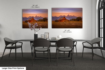 a dining room with a table and chairs