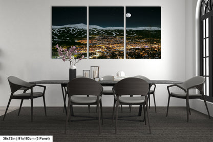 a dining room with a table and four chairs